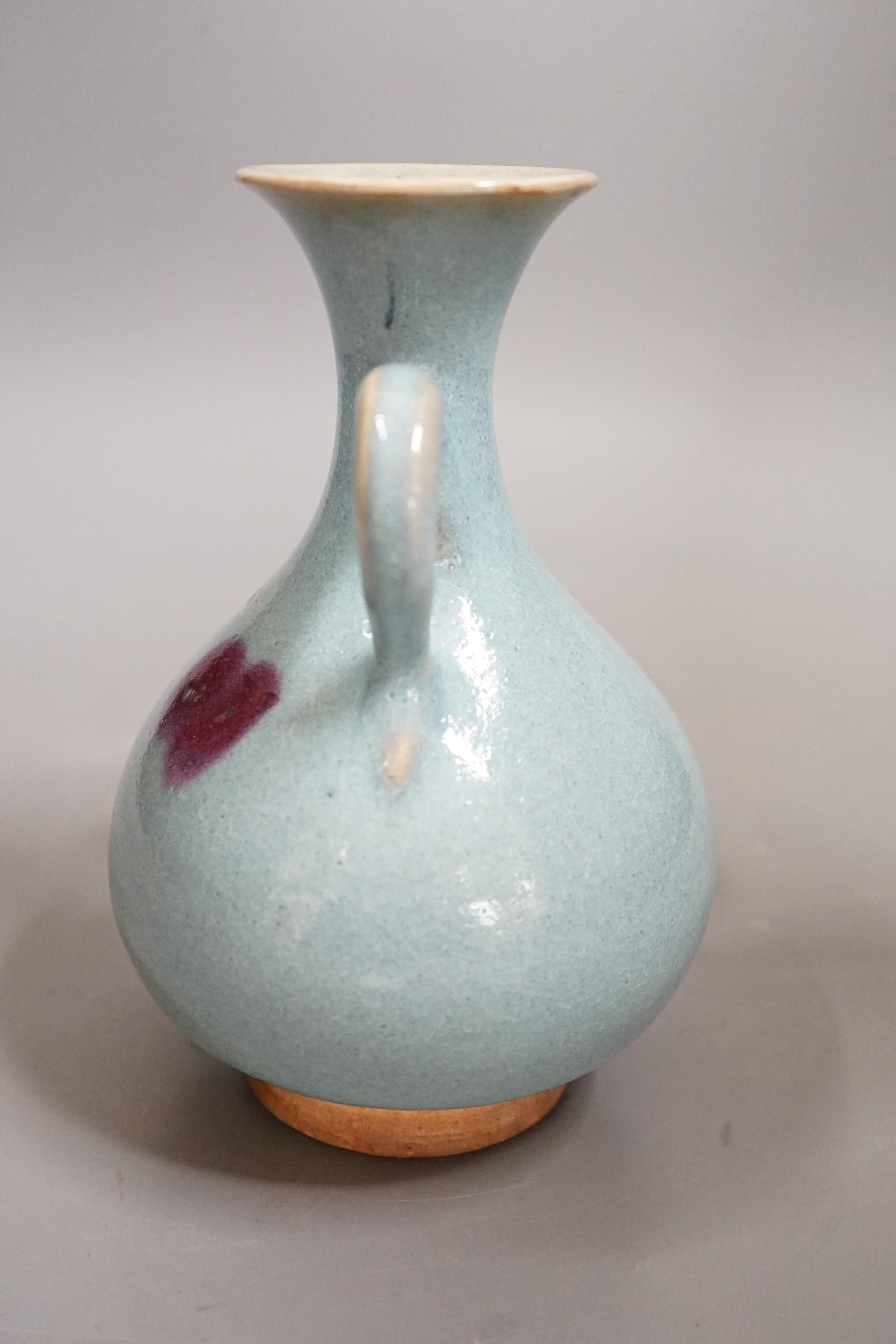 A Jun style purple splashed ewer, 17.5cms